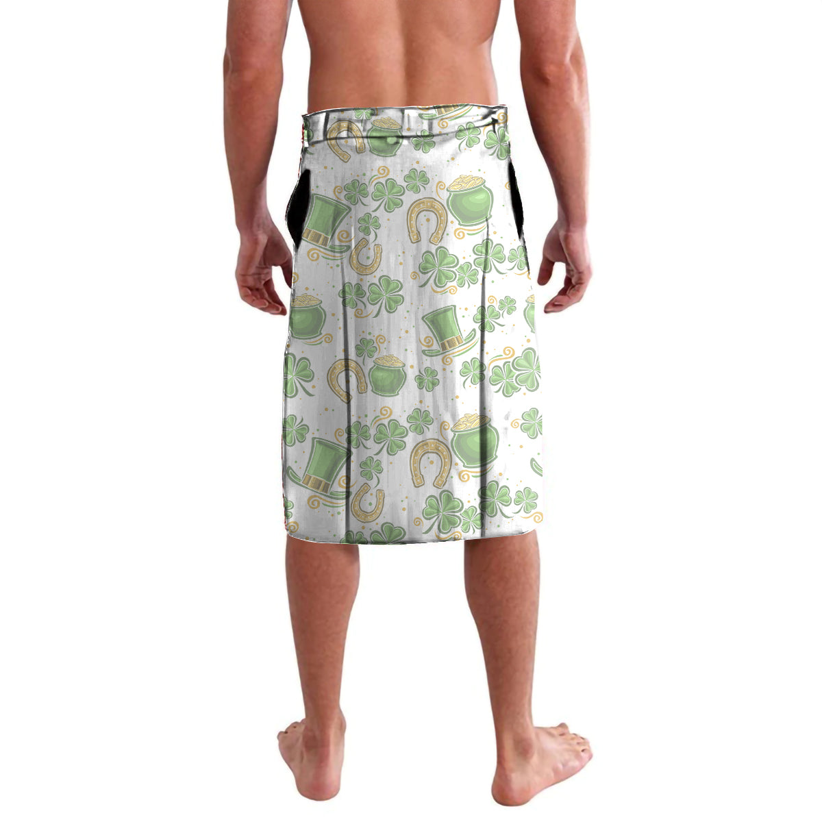 White wrap skirt with green shamrock, horseshoe, and coin pattern, knee-length