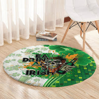 Round green St. Patrick's Day rug with 'DRINK AND IRISH' typography and shamrock art