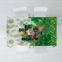 Green St Patrick’s Day tablecloth with Eat Drink and Be Irish text, clovers, money