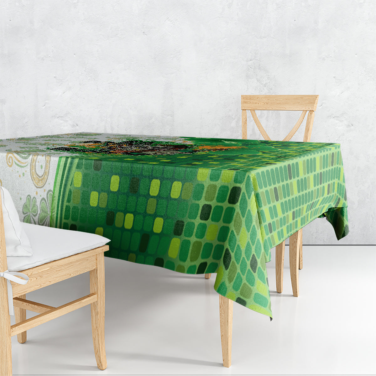 Green tablecloth with all-over mosaic pattern, draped over dining table
