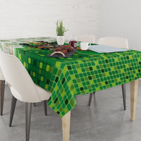 Green patterned tablecloth with mosaic design, draped on dining table