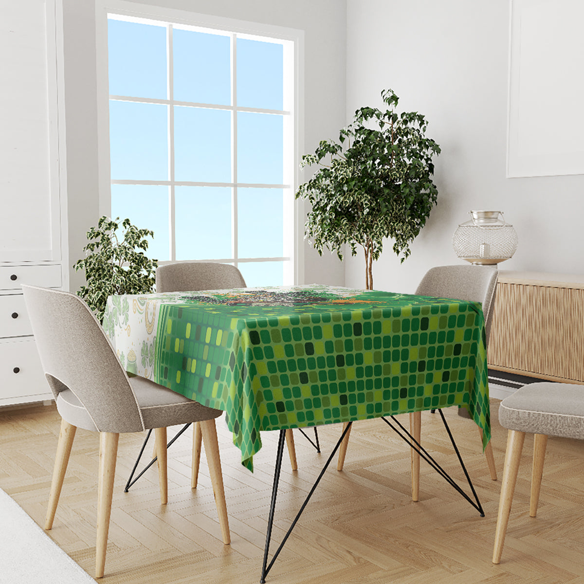 Green and white dining tablecloth with mosaic pattern covering the tabletop