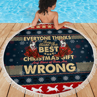 Round navy Christmas beach blanket with fringe, husky “BEST CHRISTMAS GIFT WRONG”