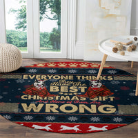 Round Christmas rug with husky graphic, snowflakes, and red outer border