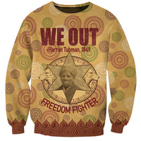 Beige crewneck sweatshirt with Harriet Tubman portrait, star graphic, and We Out text