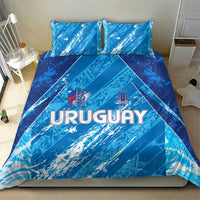 Sky blue bedding set with URUGUAY graphic crest on duvet and matching pillowcases