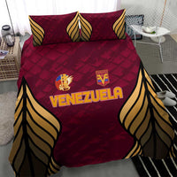 Close-up maroon Venezuela football bedding set with bold wing graphics and two pillows