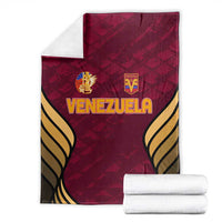 Wine-red Venezuela football blanket folded with “VENEZUELA” text and gold trim