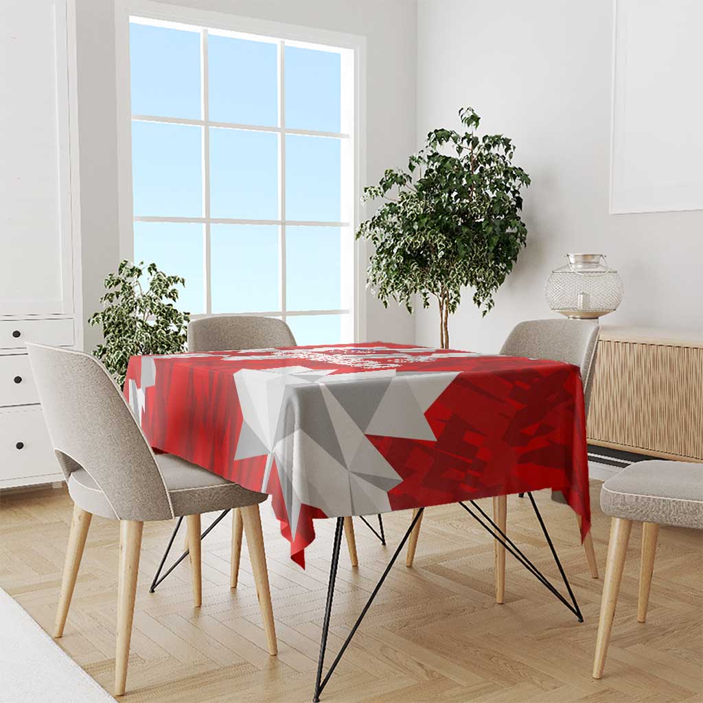 Red and white geometric Canada tablecloth on dining table with chairs around