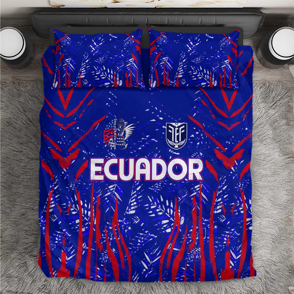 Blue duvet and pillowcases with red abstract print and 'ECUADOR' text in white