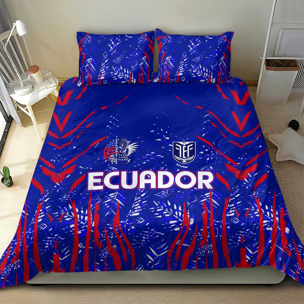 Blue duvet bedding set with red brush-stroke pattern and ECUADOR wordmark; two pillows