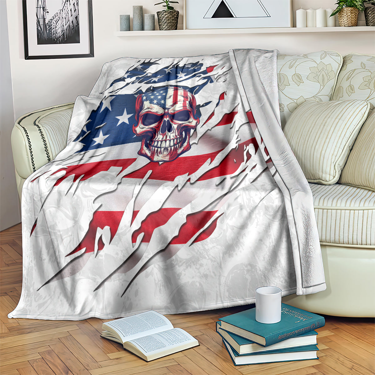 American flag skull blanket laid across couch, white fabric with blue stars and red striping