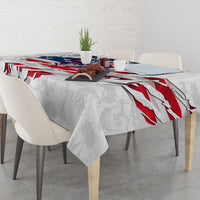White tablecloth with American flag skull design, shown across a dining table edge