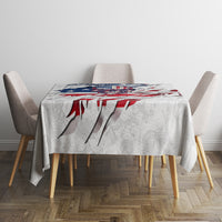 White tablecloth with American flag skull artwork, centered on a small dining table