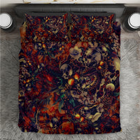 Red and multicolor skull art bedding set with matching pillowcases, flat view