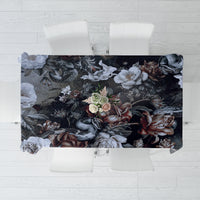 Dark patterned tablecloth with roses and serpent motifs, rectangular drape
