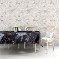 Dark rose-and-serpent motif tablecloth on table with chair backs