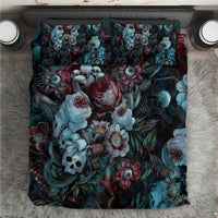 Green bedding set with skull and rose floral pattern; matching pillowcases