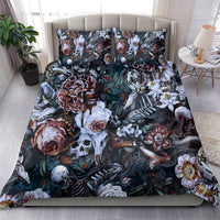 Skull and floral bedding set with two pillow shams, dark teal fabric with white skulls