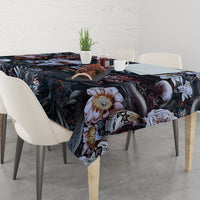 Black floral tablecloth with skull details, draped to table edges