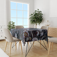 Black skull floral tablecloth over dining table with chair set