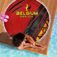 Round red and black Belgium 2024 beach blanket with tassel fringe and crest graphic