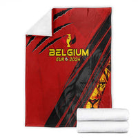Red and black Belgium football blanket with diagonal stripes, crest, and stacked fold view