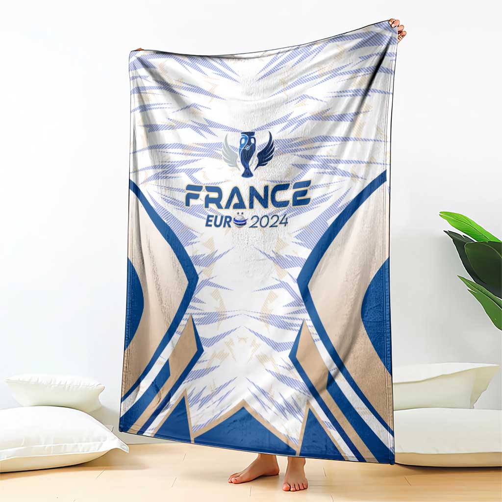 France football blanket, blue wing pattern with France Eur 2024 crest, draped around feet
