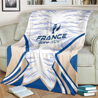 France football blanket, blue and white wing pattern with France Eur 2024 crest, on armchair