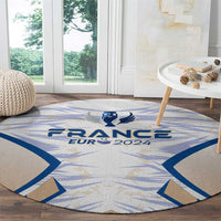 Round France EURO 2024 trophy rug, centered blue FRANCE text on light gray-beige