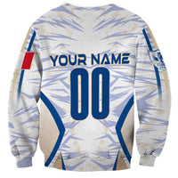 White sweatshirt back with blue name and number print, geometric pattern, long sleeves