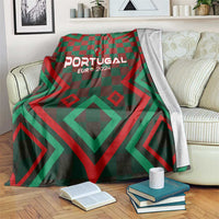 Portugal football blanket in green/red check with 'PORTUGAL EUR 2024' graphic.