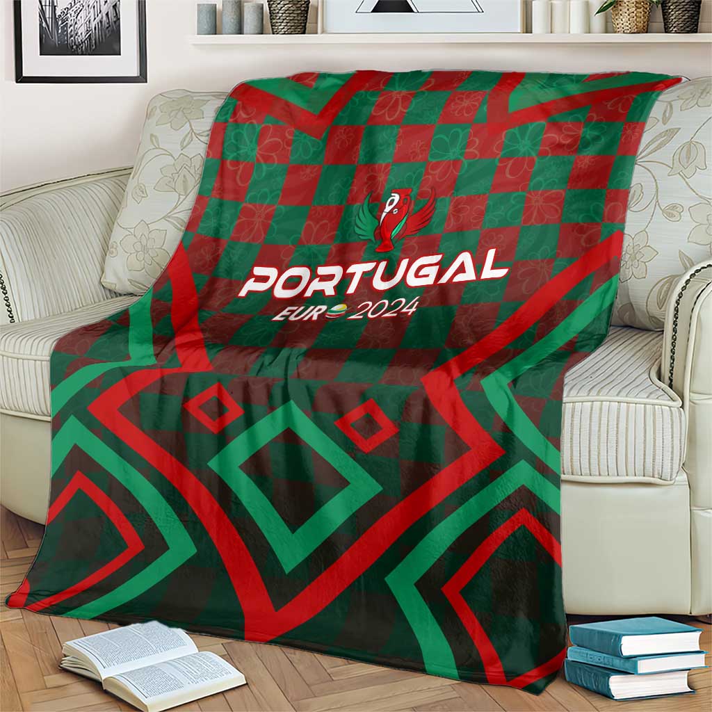 Portugal football blanket over couch, green and red pattern with 'PORTUGAL EUR 2024' crest.