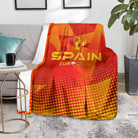 Spain football blanket on sofa, red-orange dots and stripes with SPAIN EURO 2024 logo