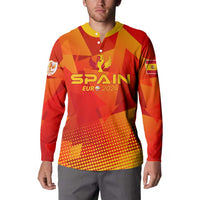 Red Spain football button sweatshirt on model, yellow collar, trophy graphic and logo.