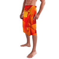 Side view of knee-length red-orange geometric soccer shorts with custom name/number