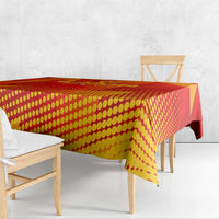 Red and yellow patterned Spain Euro 2024 tablecloth draped on table
