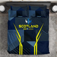 Blue bedding set with 'SCOTLAND EUR 2024' graphic, crest and yellow geometric pattern