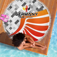 Round beach blanket with Germany EUR 2024 crest and dotted black pattern, orange/white flag print