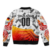 White bomber jacket back with 'YOUR NAME' and '00', Germany wing graphic, ribbed hem