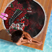 Personalized round beach blanket featuring chief skull, roses, and fringed border