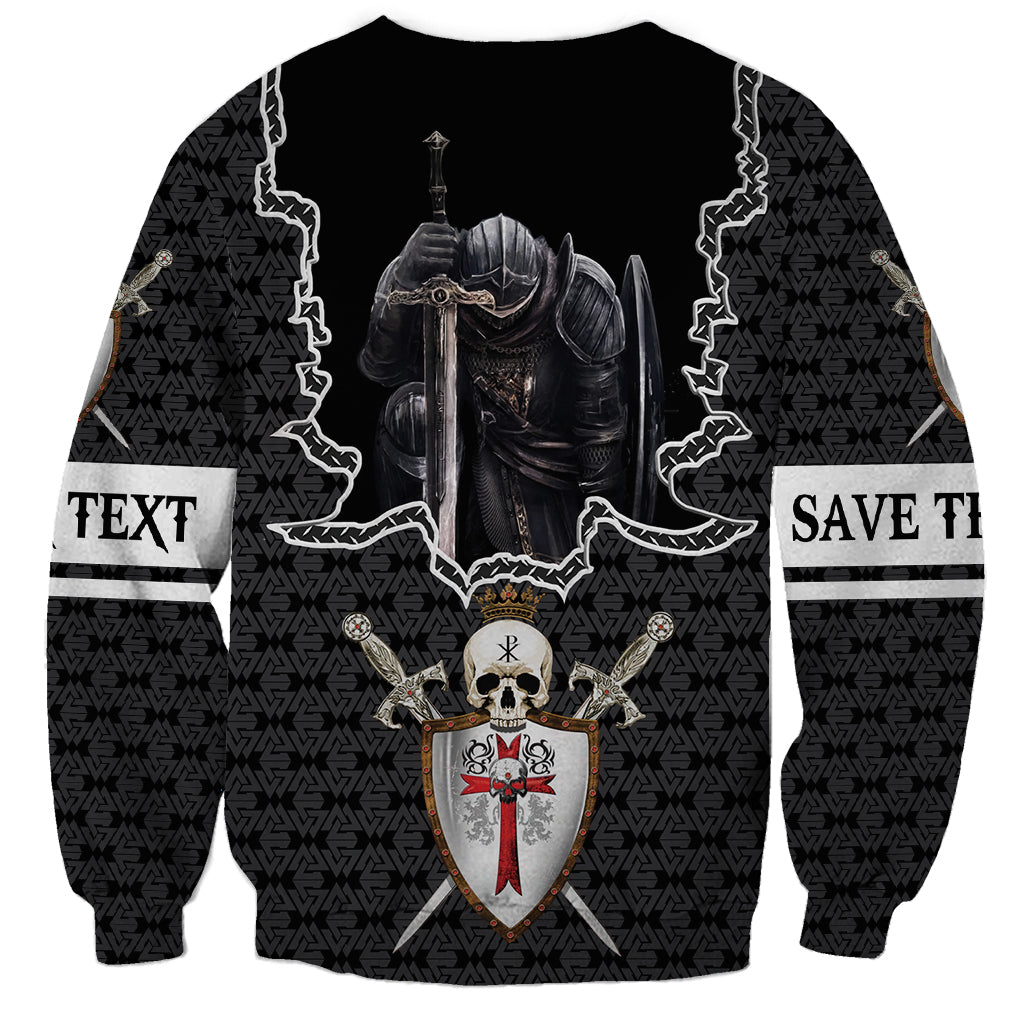 Black crewneck sweatshirt with knight skull print, shield emblem, and side text bands