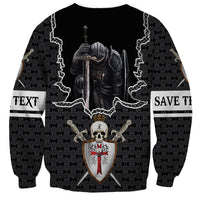 Black crewneck sweatshirt with knight skull print, shield emblem, and side text bands