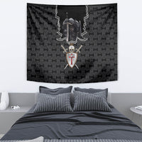 Black tapestry featuring armored knight and skull with hanging chains and crest shield