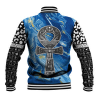 Blue baseball jacket back with large emblem and black-and-white patterned sleeves
