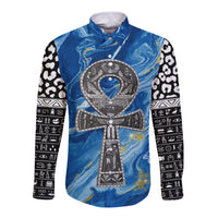 Long-sleeve button shirt with blue ankh cross front and patterned black-and-white sleeves