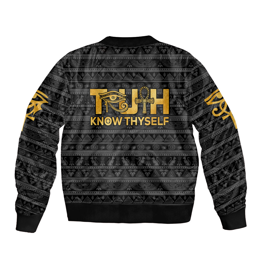 Black bomber jacket with gold Eye of Horus and ankh front graphic, ribbed hem and cuffs