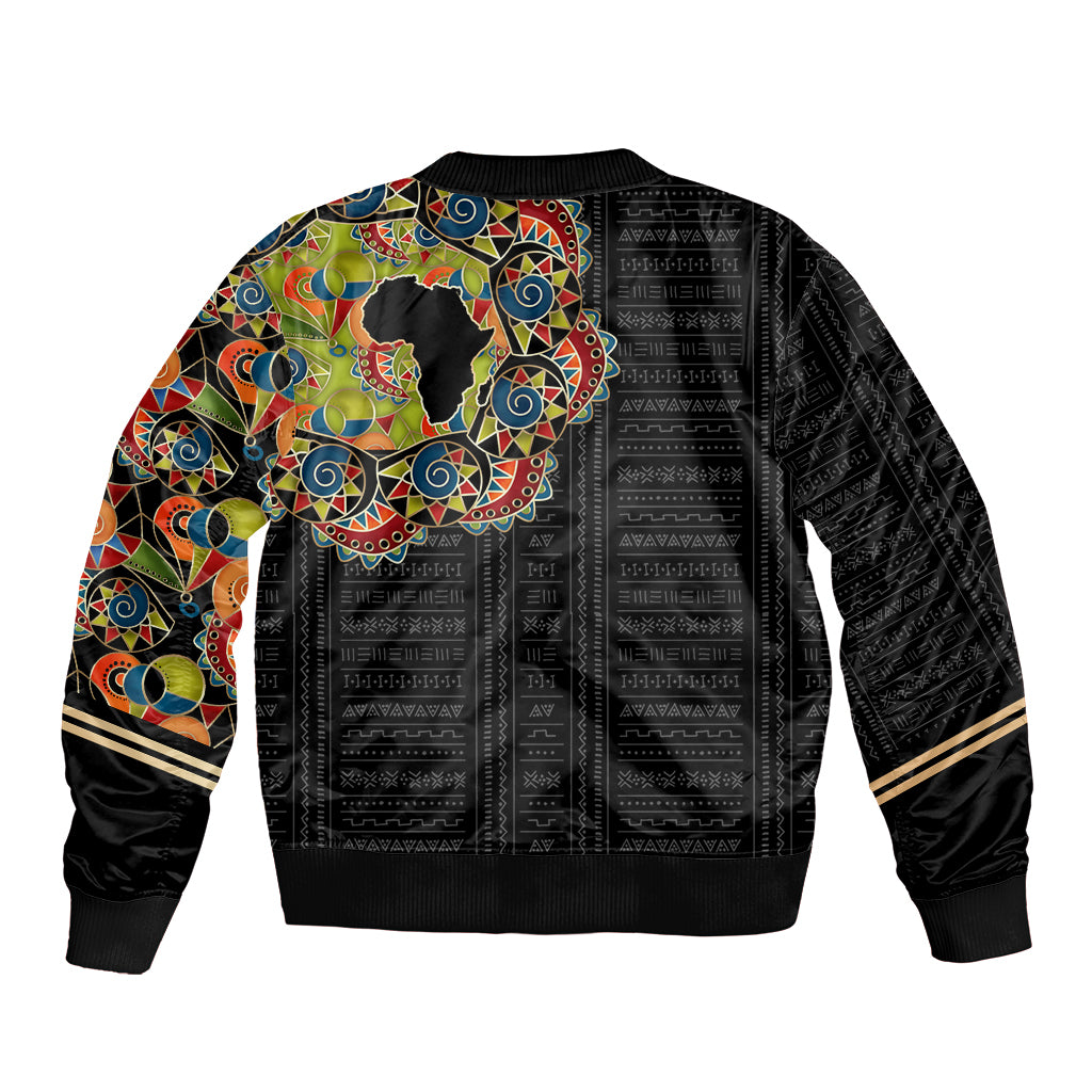 Black bomber jacket with multicolored African pattern back panel and ribbed cuffs