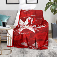 Red Switzerland football blanket with bold “SWITZERLAND EURO 2024” text over couch