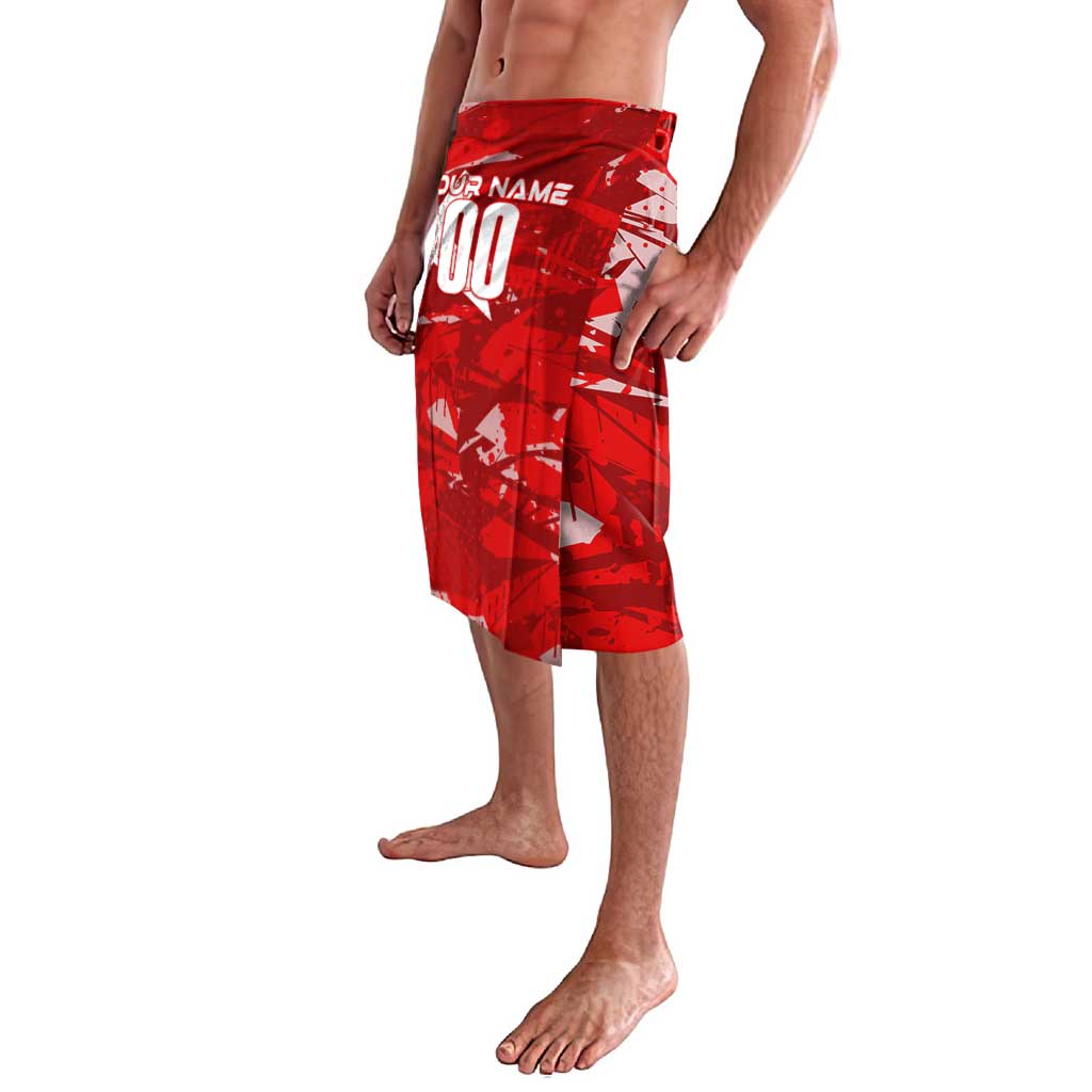 Red lavalava skirt with white pattern and side opening, side view